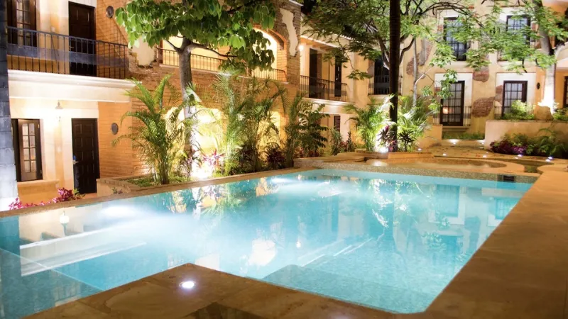 The outdoor pool area of the Casa de Adobe hotel in Oaxaca 