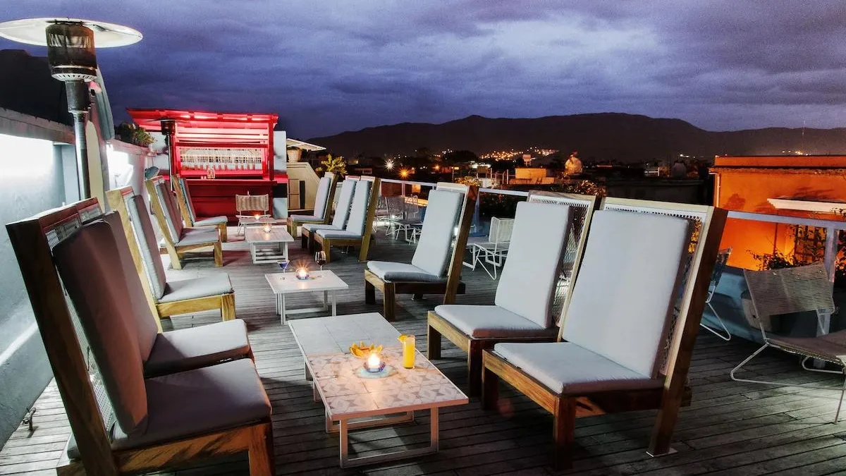 The rooftop terrace bar at Hotel Azul Oaxaca by night