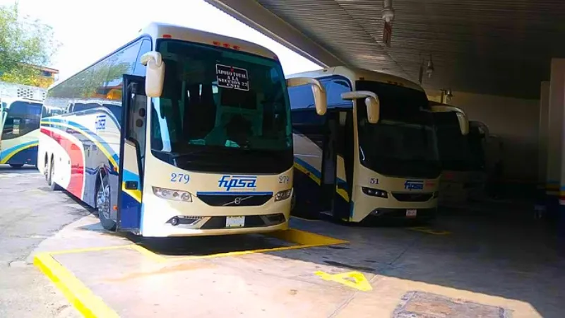 Fypsa buses parked at a depot in Oaxaca, Mexico